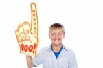 Young Boy Wearing Foam Hand Stock Photo