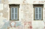 Old Faded Mural On A Wall In Citta Alta Bergamo Stock Photo