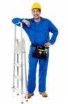 Construction Worker With Step Ladder Stock Photo