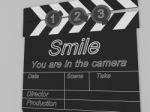 Movie Production Clapper Board Notifying To The People That Smil Stock Photo