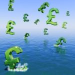 Pounds Falling In Sea Stock Photo