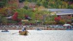 People Sailing Boats At Arashiyama, Kyoto Stock Photo