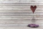Red Heart In Hourglass Stock Photo