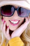 Smiling Woman Wearing Sunglasses Stock Photo