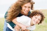Loving Mother And Son Playing Stock Photo
