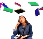 Young Student With Flying Books Stock Photo