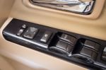 Close Up Of Controls Button Switch On The Door. Interior Detail In Luxury Modern Car Stock Photo