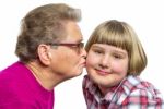 Dutch Grandmother Kisses Grandchild On Cheek Stock Photo