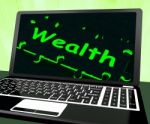 Wealth On Laptop Shows Abundance Stock Photo