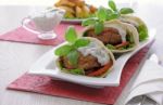 Patty In Pita Bread With Cream Sauce And Vegetables Stock Photo