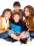 Happy Young Smiling Family With Two Boys Stock Photo