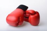 Pair Of Red Leather Boxing Gloves Isolated On White Stock Photo