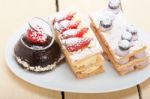 Selection Of Fresh Cream Cake Dessert Plate Stock Photo