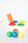 Colorful Hammer Case Wooden Toy On White Table Stock Photo