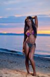 Beautiful Black African American Woman Posing On The Beach At Su Stock Photo
