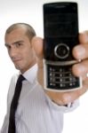 Young Businessman Holding Mobile Stock Photo