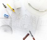 Working Table Of Architect With Related Equipment Stock Photo