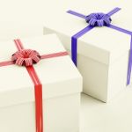 White Gift Boxes With Ribbon Stock Photo