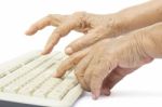 Elderly Woman Hands On Keyboard Stock Photo