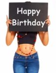 Girl Showing Happy Birthday Board Stock Photo