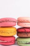 Colorful Macaroons On White Background. Macaron Or Macaroon Is S Stock Photo