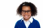 Bespectacled Primary Girl On A White Background Stock Photo