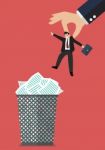 Boss Throws A Businessman In The Trash Can Stock Photo