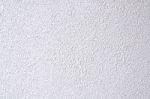 White Rugged Painted Outside Wall Stock Photo