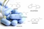 Blue Caplets And Some Analgesic Chemical Structure Stock Photo