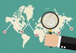 Magnifying Glass Scan Stock Market Graph With World Map Stock Photo
