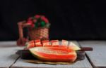 Papaya Of Cut On Wooden Stock Photo