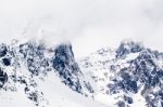 Snow Covered Mountain Peaks Stock Photo