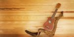 Ukulele And Twig In Vintage Style Colour With Jointed Wooden Stock Photo