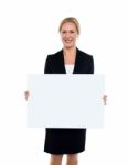 Business Lady Displaying Blank White Ad Board Stock Photo