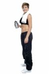 Fitness Woman Posing After Workout. Holding Water Bottle Stock Photo