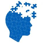 Mans Mind With Jigsaw Puzzle Stock Photo