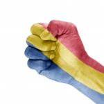 Flag Romania On Clenched Fist Hand Stock Photo