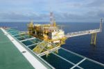 Oil Rig At Sea Stock Photo