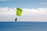 Couple Paragliding Over Atlantic Ocean Towards Playa Del Ingles Stock Photo