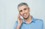 Middle Aged Man Talking On Cell Phone Stock Photo