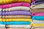 Colorful Bath Towels Stack Background Stock Photo