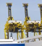 Container Cranes In Port Or Dock Stock Photo