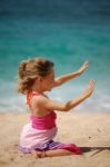 Little Girl On The Beach In Hawaii Stock Photo