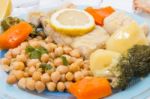 Codfish With Chickpeas And Vegetables Stock Photo