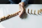 Businessman Hand Stop Dominoes Continuous Toppled Or Risk With C Stock Photo