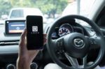 Chiang Mai,thailand - June 15, 2017 : A Man Hand Holding Uber Ap Stock Photo