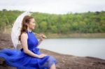 Beautiful Woman Wear Blue Evening Dress Hold White Umbrella Watc Stock Photo