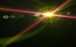 Abstract Lens Flare Light Over Black Background
 Stock Photo