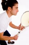 Side Pose Of Player Carrying Racket Stock Photo