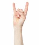 Man Hand Showing Rock And Roll Sign Stock Photo